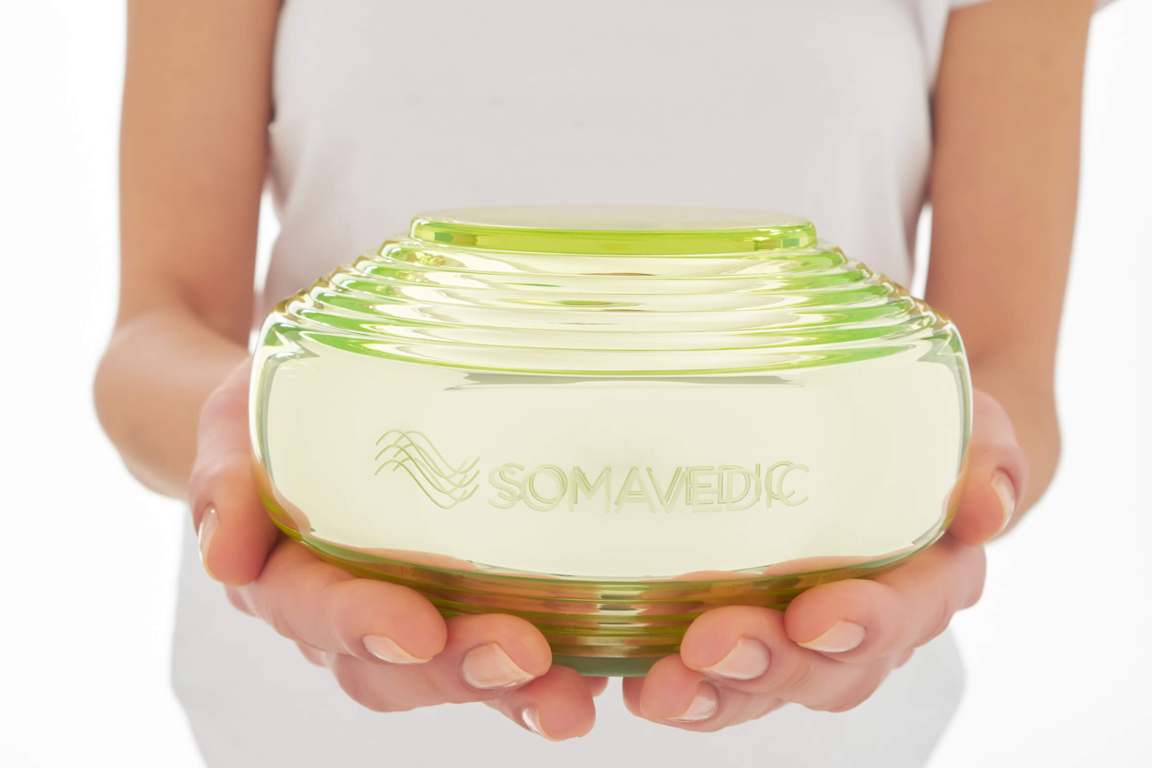 What is Somavedic and how does the frequency therapy device work