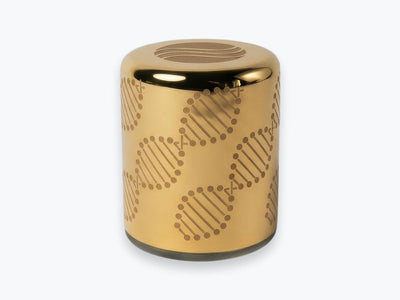 Gold Somavedic Elaura device on a white background.